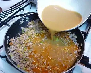 Add the seasoning into the pork to mix and combine.