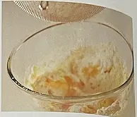 3 Sift the flour and cornflour over the creamed ingredients. This will remove any lumps and incorporate air, making your cookies lighter. Add the ground almonds and stir together to make a soft dough.