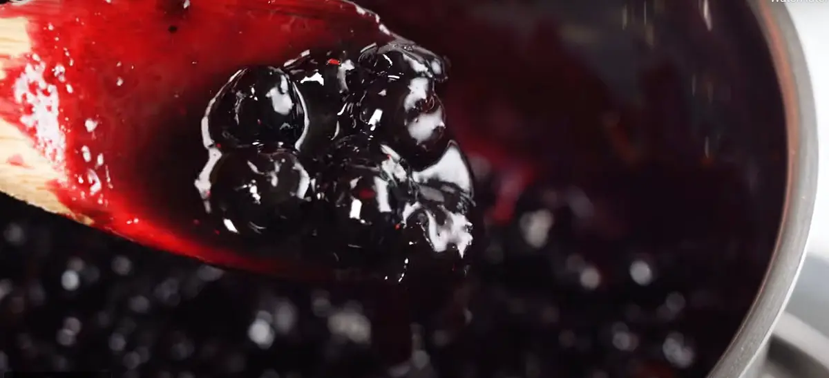 Once cool, stir. Adjust thickness 1/2 teaspoon of water at a time to make it the perfect "oozing" consistency (see video, Note 7) - be careful, don't make it runny!