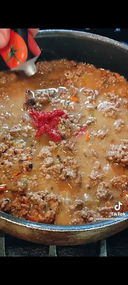Add Tomato paste, plenty of salt and pepper, and any additional spices.