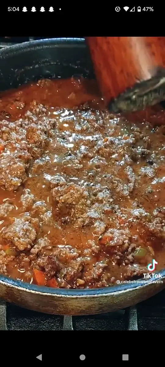 Simmer down till there is minimal liquid, and place in oven pan.