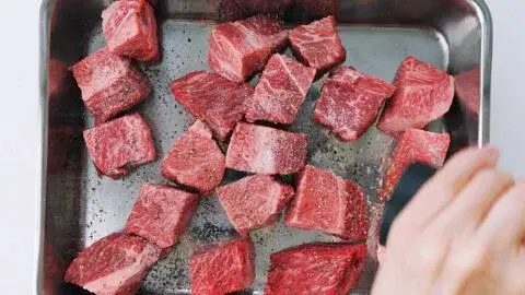 Sprinkle the beef on all sides with salt and pepper.