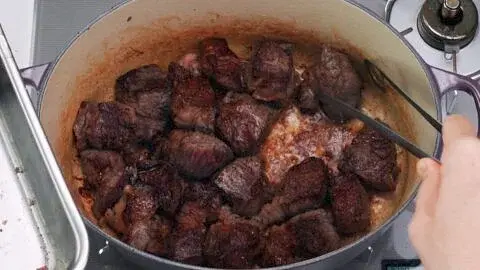 Once the beef has browned on one side, flip it over and brown the opposite side (another 3 minutes). Transfer the meat to a bowl and set it aside.
