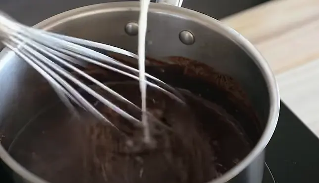 At this point, whisk in the cornstarch slurry. Continue to heat until thickened.