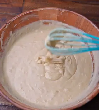 1. Use a blender or electric mixer to whisk: Eggs, Vanilla extract, Vinegar, Sugar, and oil/butter together.
2. Grat 2 tbsp of Orange zest using (don't grat the white zest)
3. Squeeze 2.5 Oranges to have 1 cup of juice
4. Blend Orange juice and zest together for 1 minute.
5. Use a sieve to sift 2.5 cups of flour
6. Add 2 Tbsp of cornstarch to the flour
7. Add 1.5 Tbsp of baking powder to the flour
8. Add 0.5 tsp of salt to the flour
9. Use a blender to whisk all these ingredients together for 1-2 minutes, until the mix has the same consistency as Tahini sauce.
10. **If the mixture is too thick add water, milk, or orange juice.
11. **if the mixture is too flowy add more flour. 12. Preheat the oven to 350F.
13. Pour the mixture into a round tray and place it into the oven for 30 minutes.
14. **Take it out of the oven when a toothpick inserted into the center of the cake comes out clean. 15. **If the top is browning quickly while baking, cover loosely with aluminum foil. 16. Allow cake/cakes to cool completely on a wire rack.