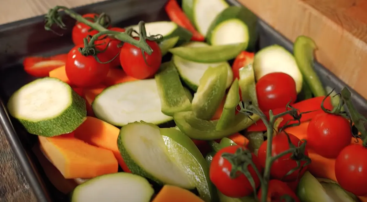Rough-cut all vegetables and layout on non-stick baking tray. https://youtu.be/JoF2GvY36lI?t=29
