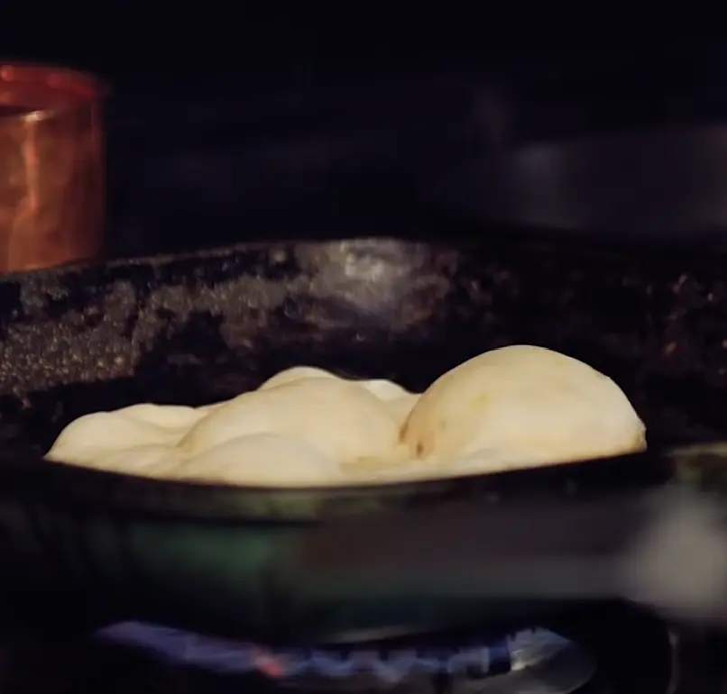 Cook over a hot, preheated pan with chili oil until browned and slightly bubbling on the top side.