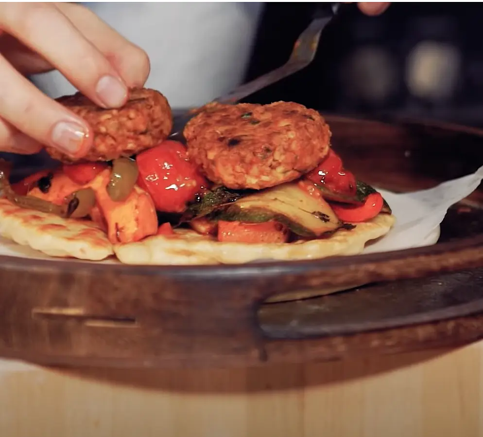 Add falafels over top of vegetables