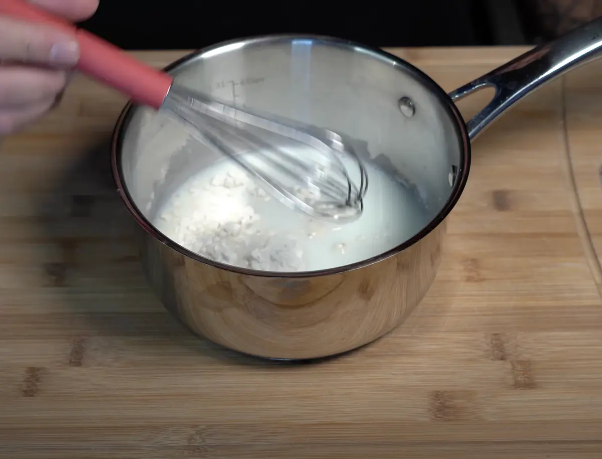 In a sauce pan put on a low heat and whisk constantly until it thickens When the paste starts to become slightly solid, take off the stove and let it rest for a bit