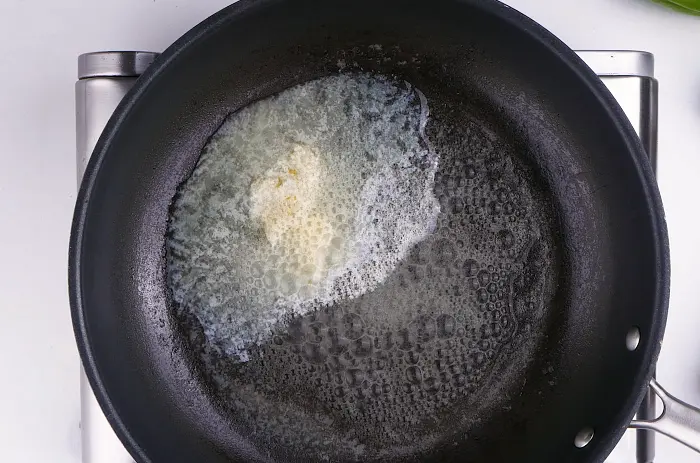 In a skillet, melt butter over medium heat.