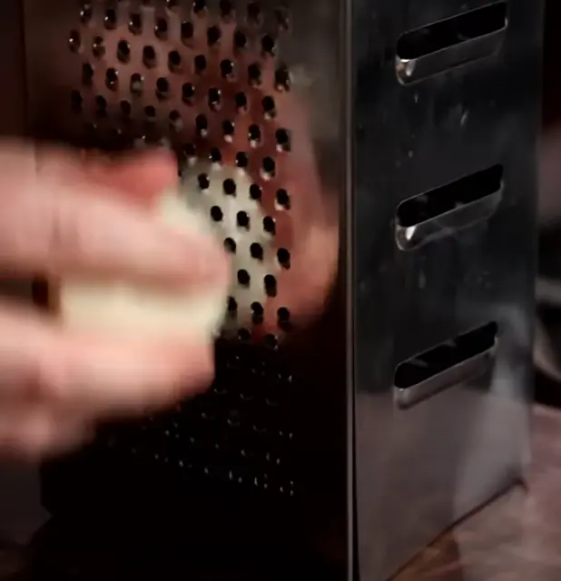 Grate half an onion