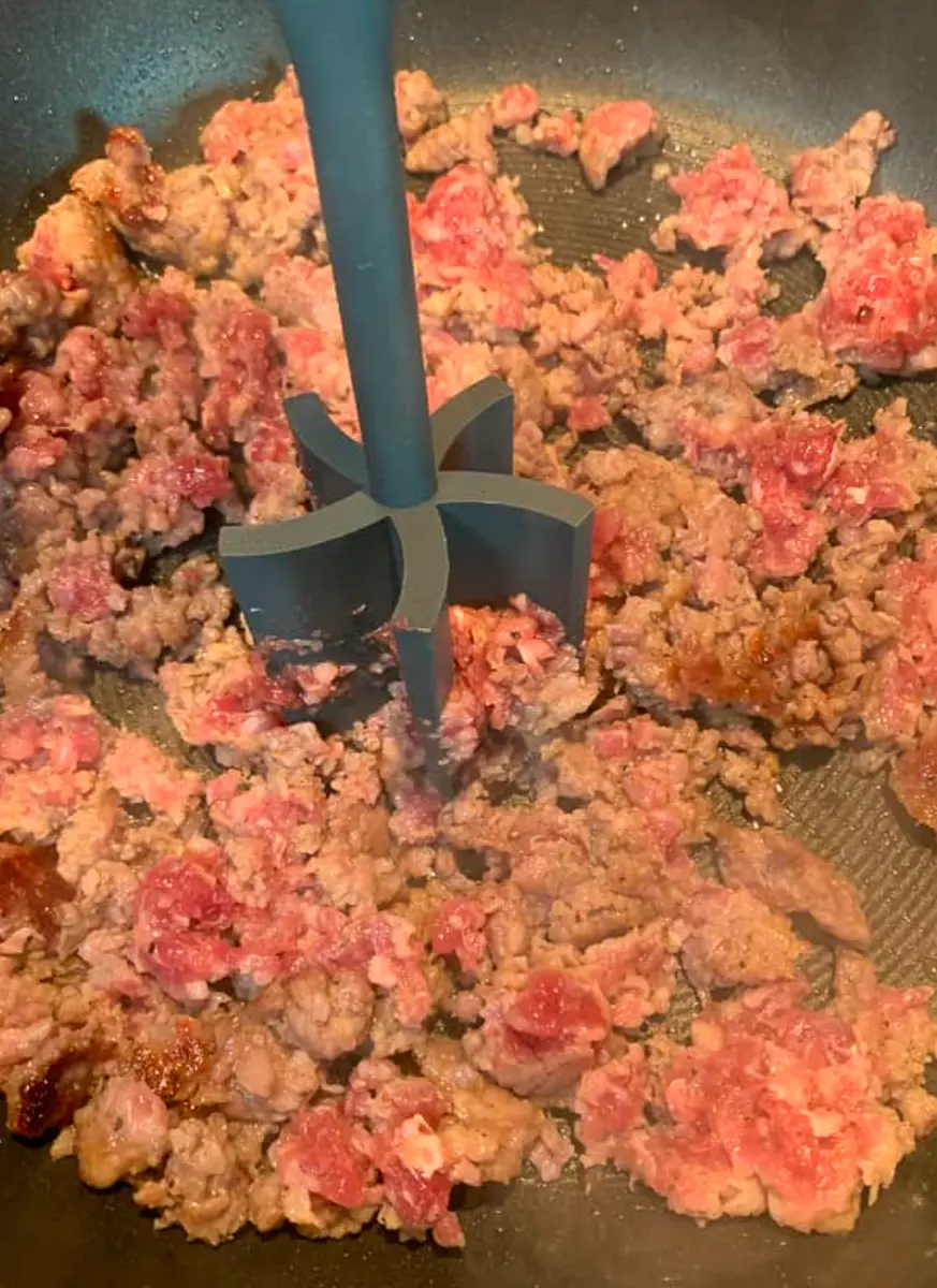 Cook sausage, drain.