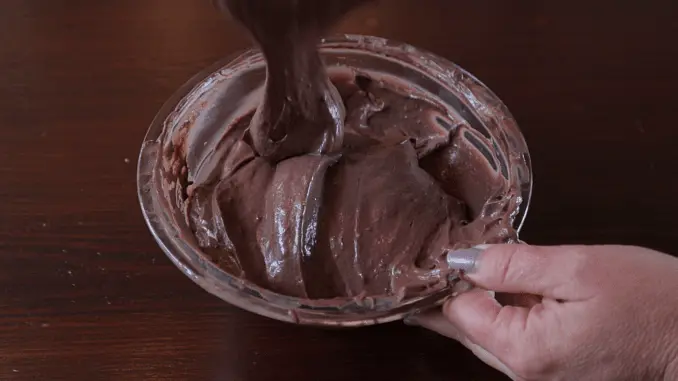 Place the mousse in the freezer for 5-10 minutes to allow it to thicken. When it's the consistency of icing, it's ready for filling between the cakes!