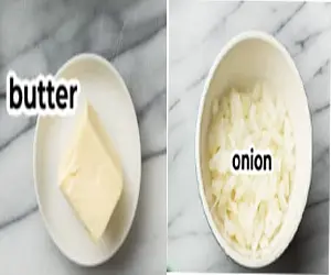 In a pot, sauté the butter and onion over medium heat until it's lightly browned (about 5-7 minutes).