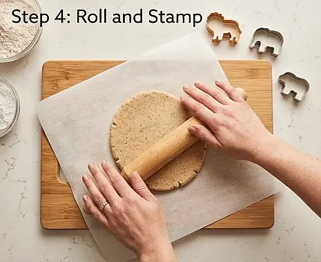 Preheat your oven to 350°F (180°C). Lightly dust your counter with a pinch of whole wheat flour (or roll between parchment paper). Roll the dough out to a uniform 1/8 inch thickness. Stamp out your animal shapes.