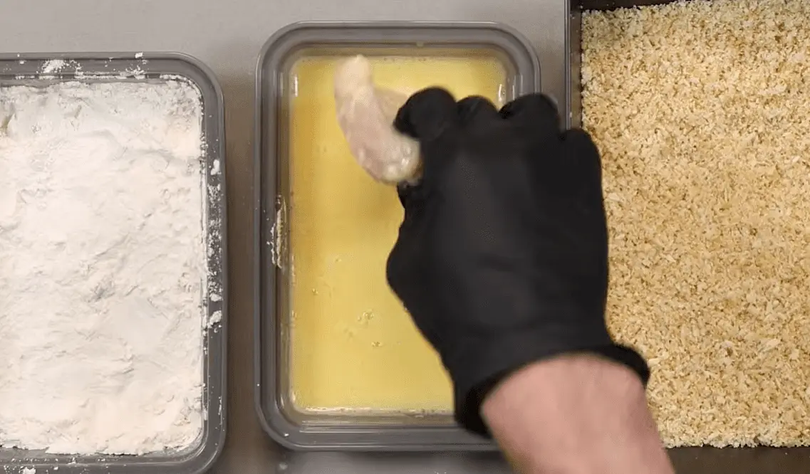 Bread the Chicken
Set up the dredge stations
For each piece:
- Coat completely in flour.
- Dip into egg whites. (make surfe no dry whit spots left)
- Coat heavily in the panko mixture.
- Press the crumbs firmly onto the chicken. (fill all crevices)
- Return to a sheet pan.