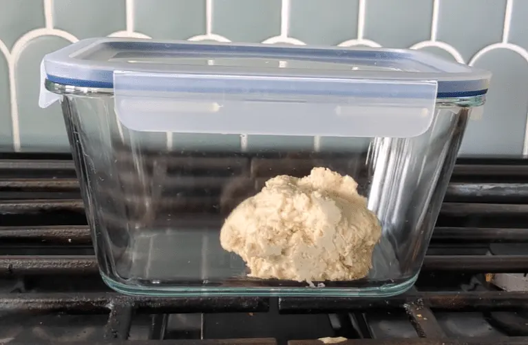 Build the Sweet Stiff Levain (4–6 Hours Before Mixing)
Combine 40g starter, 80g bread flour, 40g water, and 10g allulose into a firm dough ball.
Place in a small covered jar with unlatched lid at room temperature for 4 to 6 hours until doubled in size and visibly dense and puffy.