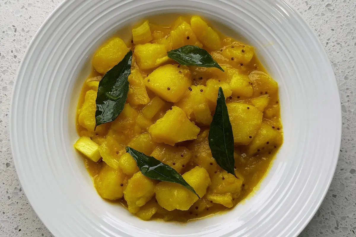Finish with curry leaves: After resting, stir through 1 handful curry leaves and serve.