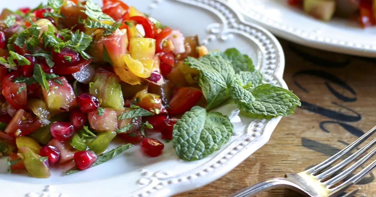 Ottolenghi's tomato and pomegranate salad Recipe | Samsung Food App