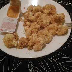 I made 8 servings. While the nuggets didn't have much taste to them besides cauliflower, a good sauce will fix 'em right up! I used peanut oil instead of canola/olive oil and baked at 250°F for 30 minutes. Overall the proportions were really good!