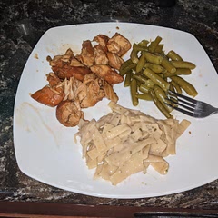 I had some frozen Kroger chicken and needed a quick kid friendly meal. I didn't have any rice, but I found some stroganoff noodles in the cabinet and made some green beans, too. Everyone is happy from mom to the baby and even the teenager with Autism!