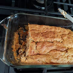 I think the oven temperature was a bit high for this banana bread recipe. The outer crust was very dry while the inner part of the bread was slightly moist. I added crushed walnuts to the recipe and sprinkled some cinnamon & sugar mix on the pan before adding the mix.