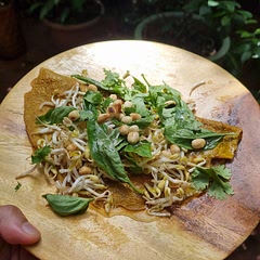 I added caramelized onion. I think you can also replace the egg with crepe since the lime, fish and lime sauce combo overpowers the taste of the egg, so a crepe will do as well.