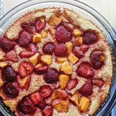 the easiest cake ive ever made, gives me cobbler vibes. added a touch of almond extract and peaches because summer.