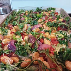 Super fast and VERY yummy! next time I will roast double the amount of garlic cloves for the dressing. Used a full red onion but only 1 pint cherry tomatoes. It made just enough for 2 full servings for 2 adults, no leftovers.