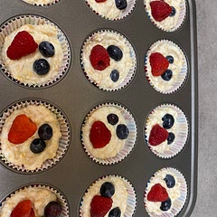Mix the yogurt and condensed milk together and add the corn flakes after then use cupcake pan to place it is easiest. In fridge after.