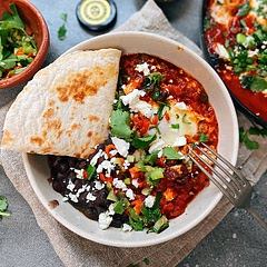 Quick tip is to serve these huevos rancheros with warm Burrito Wraps ready to soak on all the delicious sauce . Don't forget freshly made black beans on the side. Susy V Head Chef at Luchito 