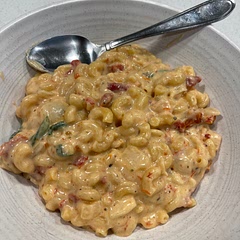 I would suggest half the amount of sun dried tomatoes, cooking the pasta separately and make sure to use a small onion or half of a large one. Delicious! Had to use cheddar but expect the gruyere is better