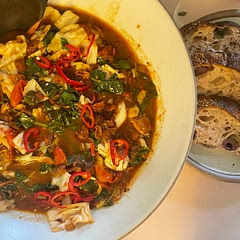 This was a really great way to clean out my fridge - I used some past-it’s-prime cabbage and spinach and I had a package of bacon already open. It’s hearty! Definitely recommend some bread or grain to soak up the broth! The drizzle of olive oil at the end is important as it balances out the acid of the tomato and sherry vinegar. A great recipe to play with! Also would say this is three VERY hearty or four medium servings as a main, but could be 8 more as a side or complement!