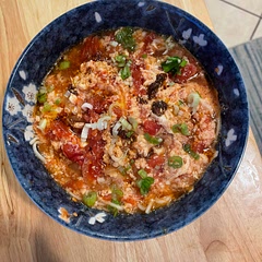 This was realllllllly good. My new favorite way to use ramen noodles. Added chili oil and soy sauce on top which was great. First time making a recipe like this, I reduced the sugar to 2 tablespoons and thought it was the right amount of sweet and tangy. I only had a can of whole tomatoes, so I squished them up before adding all of them and the juice to the pot. Definitely going into rotation!