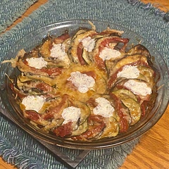 This is definitely going to be an “end of tomato season” go-to. I halved the recipe to fit in an 8 inch pie dish. Also added a few pearls of fresh mozzarella before covering for the last 15 minutes, because I had some that needed using up. We had it as a side, but this would be also make an amazing appetizer layered on slices of toasted Italian bread.