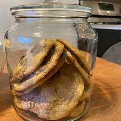 About 2tbsp per cookie, flatten with hand and shake baking sheet once out of oven. Baked for about 12-13min. Use chocolate chips & dark chocolate chunks. Leave cookie dough for 1 hour -overnight. Double the recipe to make 24