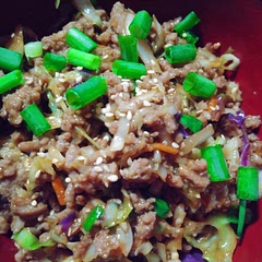 Less soy sauce a dash of hoisin more egg and add some chinese 5 spice some fresh ginger, thyme, and scallions and some pepper. 
Asian chili garlic sauce and some shredded carrots. Top with sesame seeds