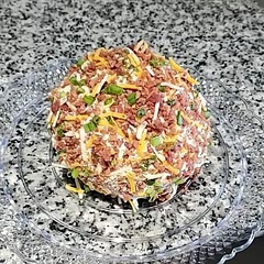 I omitted the nuts. Next time I will omit the poppy seeds. This cheeseball taste amazing but is a little salty.