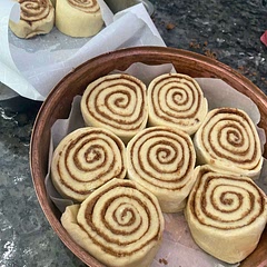These were really fun to make. They take some time, but the final flavor made it completely worth it. I used a standing mixer instead of a wooden spoon, otherwise followed the recipe.

Image above from post-slicing roll, pre-rise and bake!