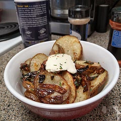 Tossed in the onions directly after the potatoes as instructed, but unfortunately the onions came out a little burnt. Potatoes were spectacular, though, worth the time put in!