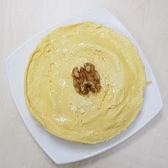 It's easy to make and I prefer to serve chilled. I find 3.5oz cream cheese tastes the best for me, almost like the real cheesecake!
