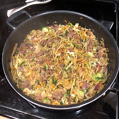 No cabbage so used a bag salad with multiple greens including cut Brussel sprouts. Used ground beef. My somewhat picky son liked it.