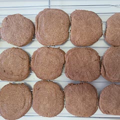 It's best to flatten the ball of dough, dip in sugar both sides, then press with cookie press.
