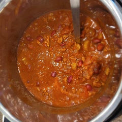 Next time I make it, I'll cut back either the water or tomato sauce a bit to make a thicker chili....just personal preference