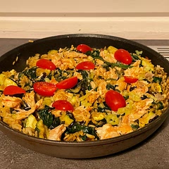 I've completely freestyled this recipe, using most of what I already had in the fridge (zucchini instead of green beans) and topped it off with some spicy salmon instead of eggs