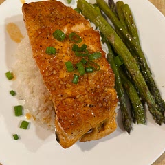 Delicious and very easy to make. If you want to keep the salmon skin crispy place the salmon skin side up when you place it back into the sauce.
