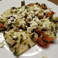 Lots of effort but worth it! Freeze leftovers in batches to enjoy again later. I served it with a Herbed White Wine Butter Sauce, chicken, sautéed red pepper, red onion, mushroom and spinach. Topped with feta. So good.