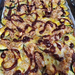If you need a way to trick someone into eating their veggies, this is awesome! You can't even taste the Zucchini! It's like eating BBQ chicken pizza but without the breading. It's delicious and easy!