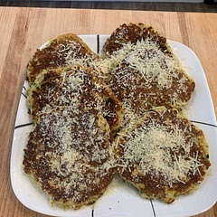 I added garlic power, onion powder, regular onions ( didn’t have green onions), mixed yellow squash and zucchini. 1/4 cup Italian breadcrumbs.  These pancakes were absolutely delicious, my husband said this recipe is a keeper.
