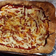 Great pizza dough. I baked it for 5min by itself and 10min with sauce and cheese and it baked all the way through.